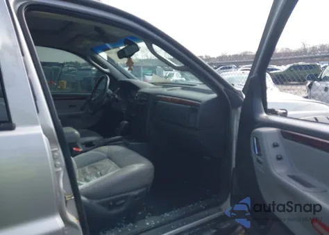 2003 Jeep Grand Cherokee Overland z USA, uszkodzony, nr VIN 1J8GW68JX3C501521